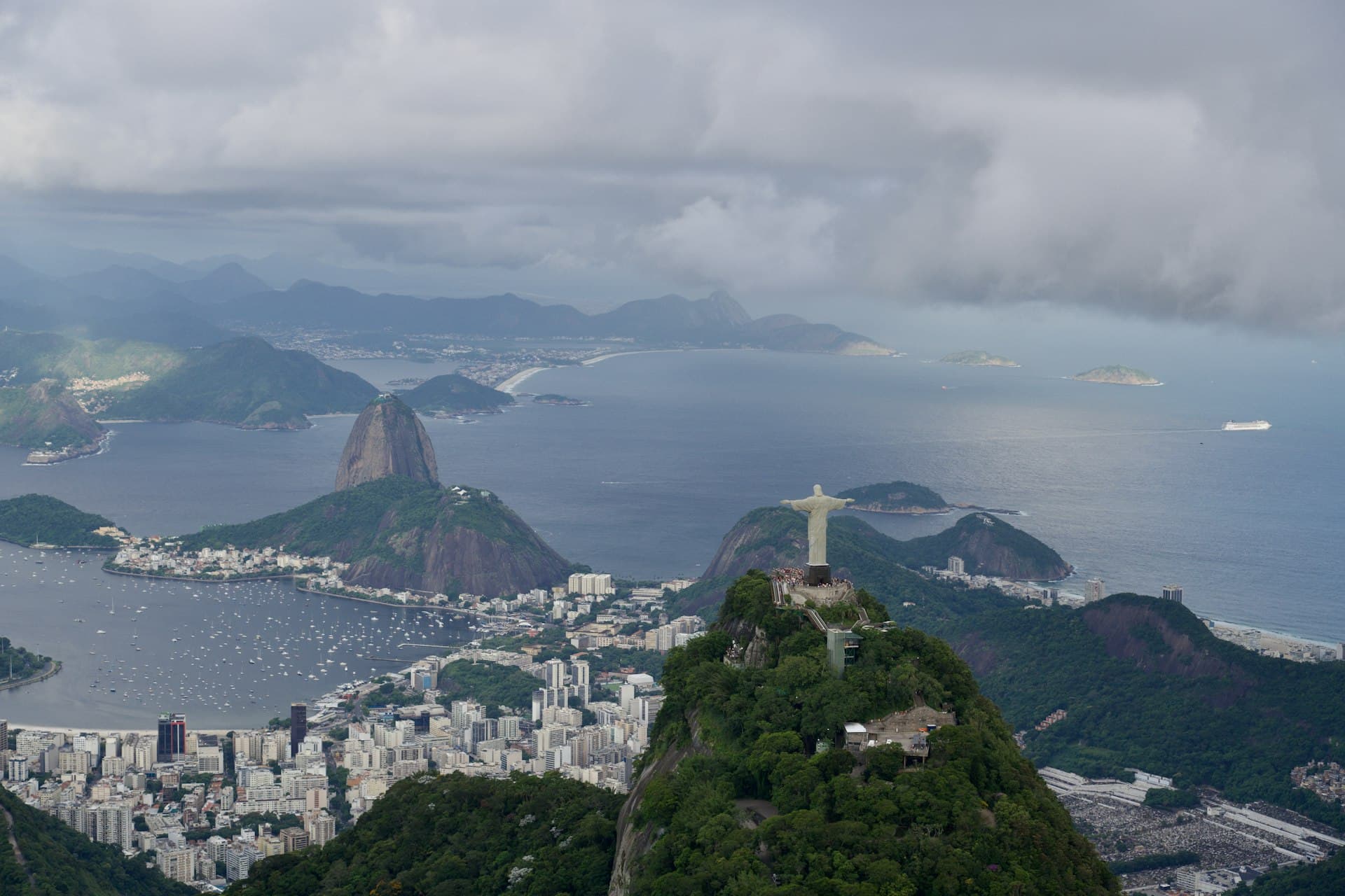 Aerial view of Christ the Redeemer and Sugarloaf Mountain overlooking Rio de Janeiro coastline, Brazil