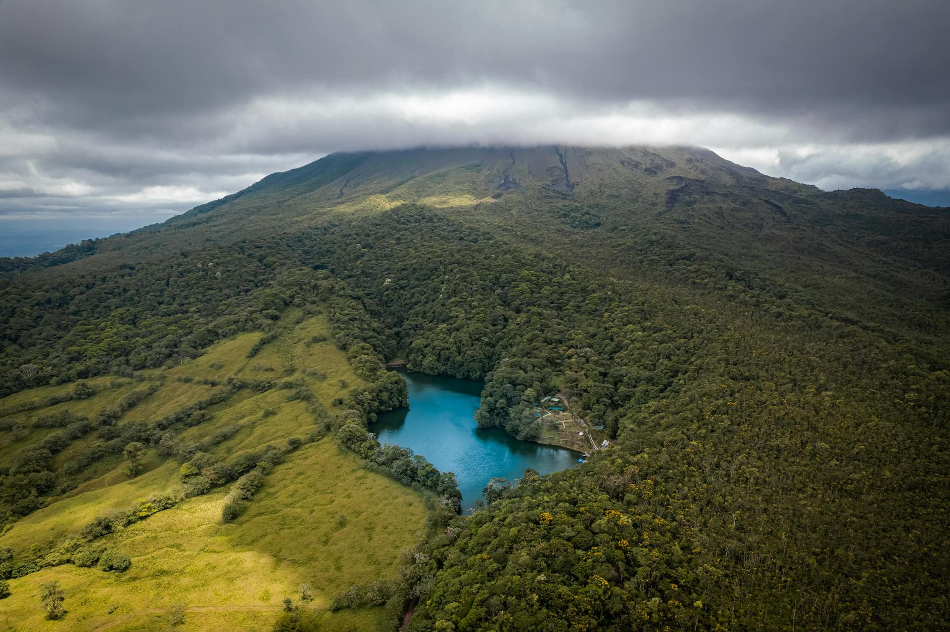 Aerial view of Arenal Volcano surrounded by tropical rainforest, Costa Rica