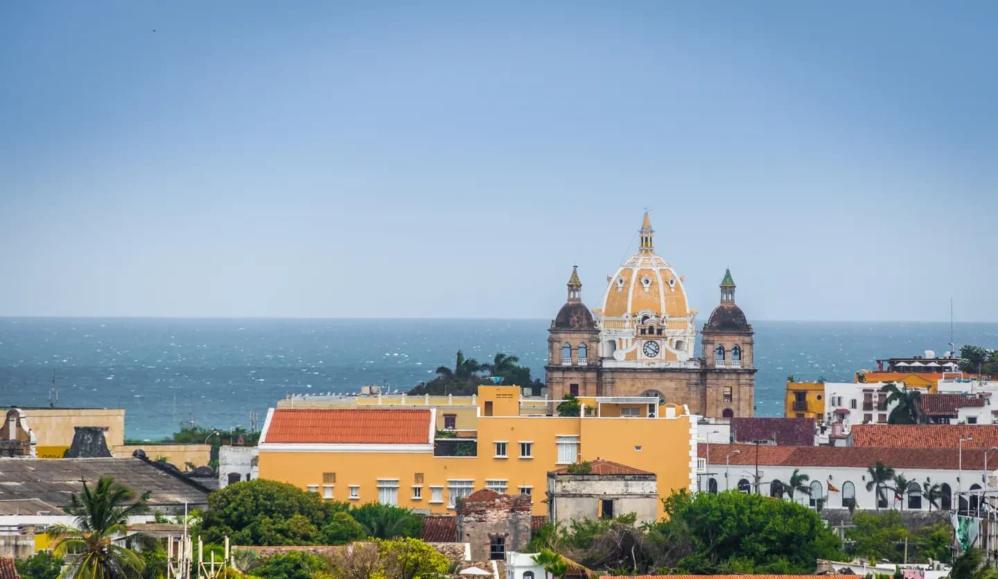 The dome of the San Pedro Claver church above the walled city and the Caribbean, Cartagena, Colombia