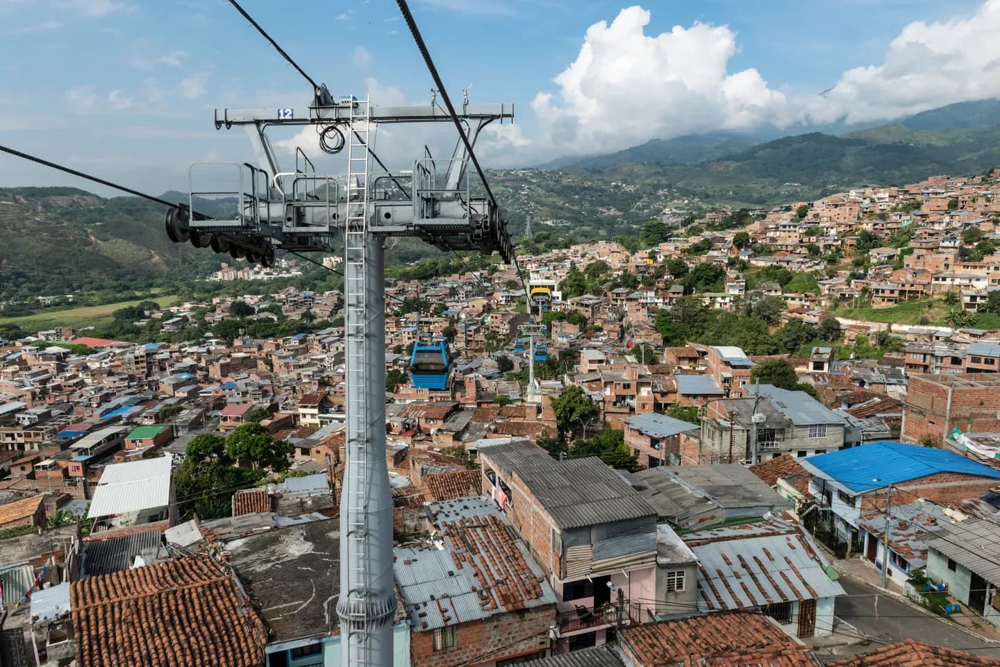 A metro cable car above the hillside neighbourhoods of Medellín, Colombia