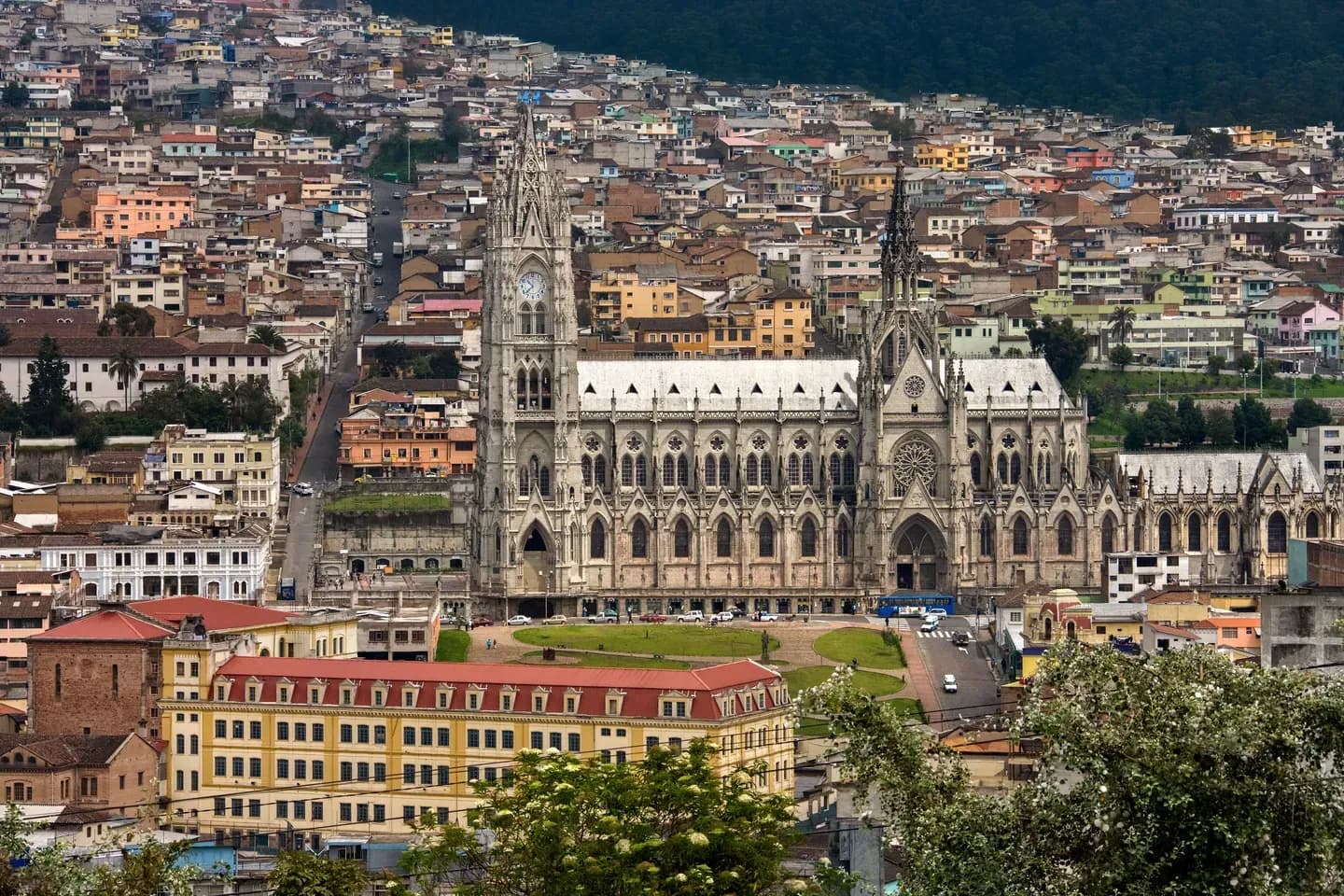 The Gothic Basilica del Voto Nacional rising above the houses of old Quito, Ecuador