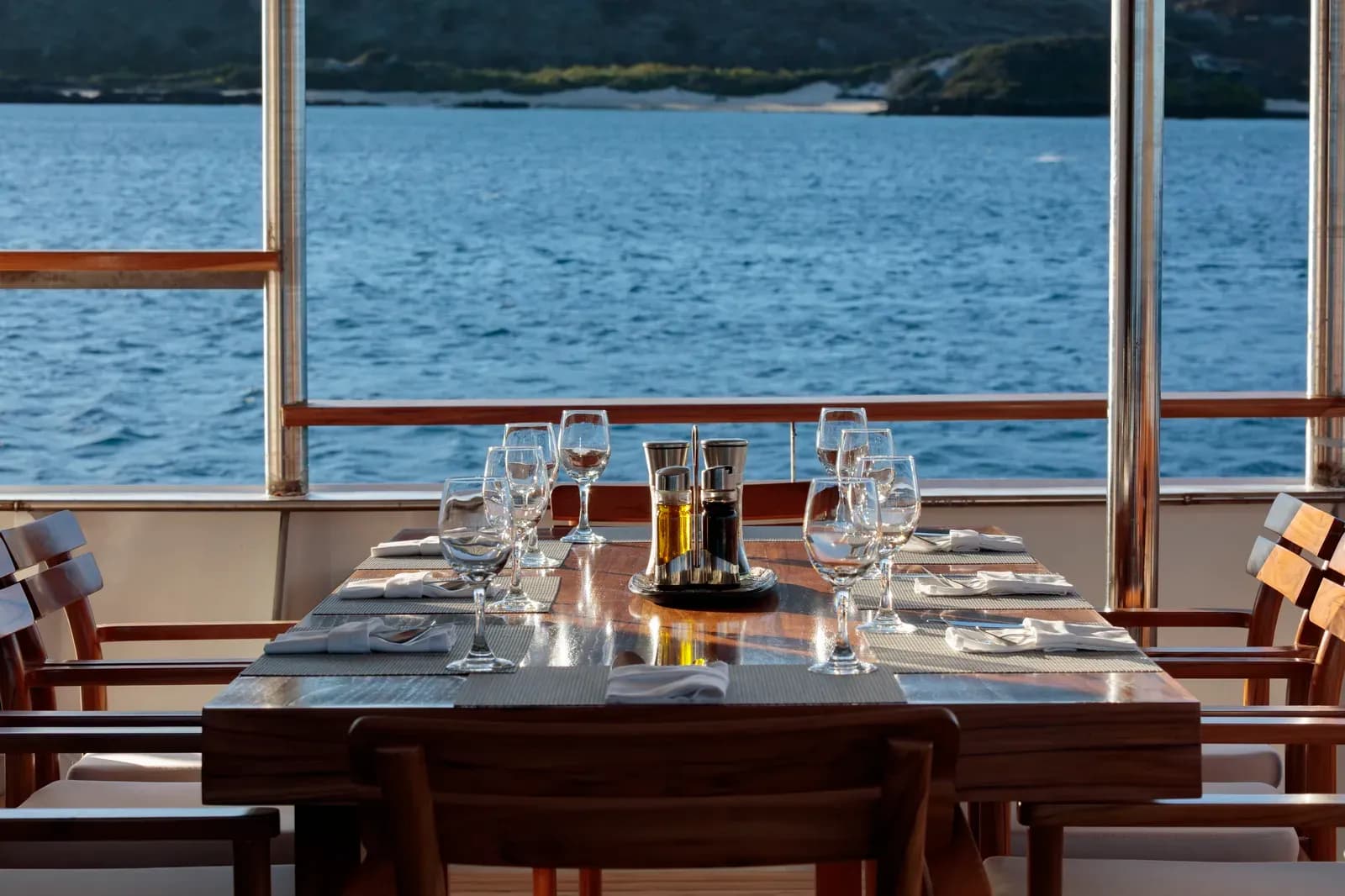 Al fresco dining table aboard Evolution, Galápagos