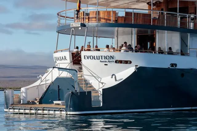 Evolution yacht at anchor, Galápagos