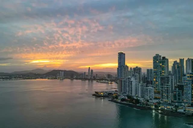 Sunset over the towers of the Panama City skyline and the bay, Panama