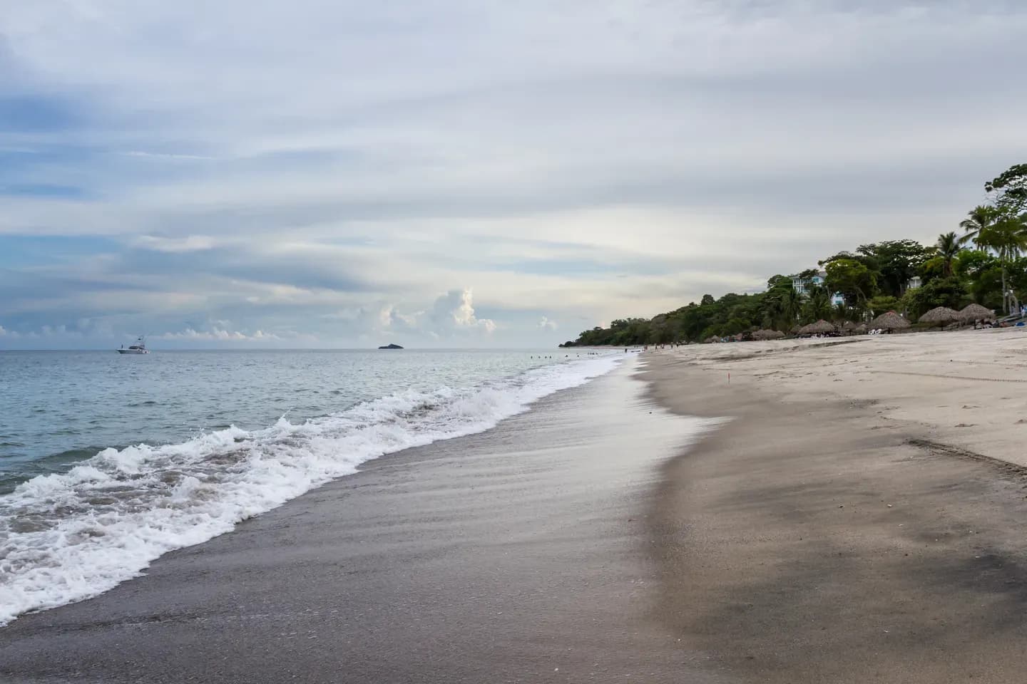 Waves running up a quiet beach at Santa Clara on Panama's Pacific coast