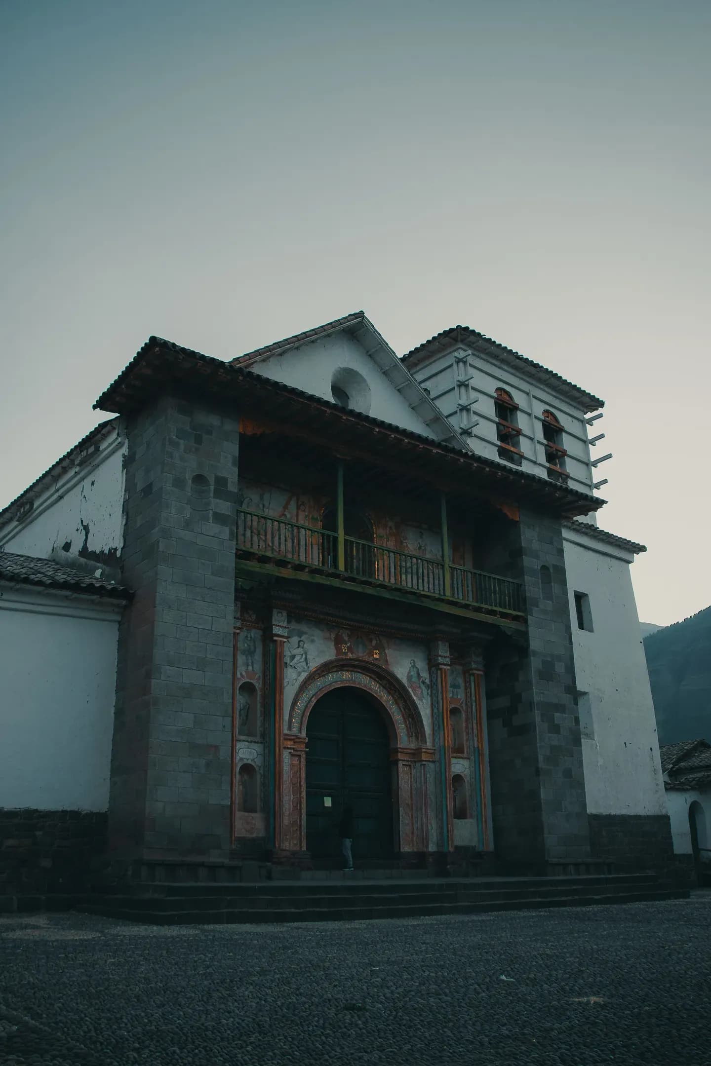 The colonial church of San Pedro in Andahuaylillas at dusk, near Cusco, Peru