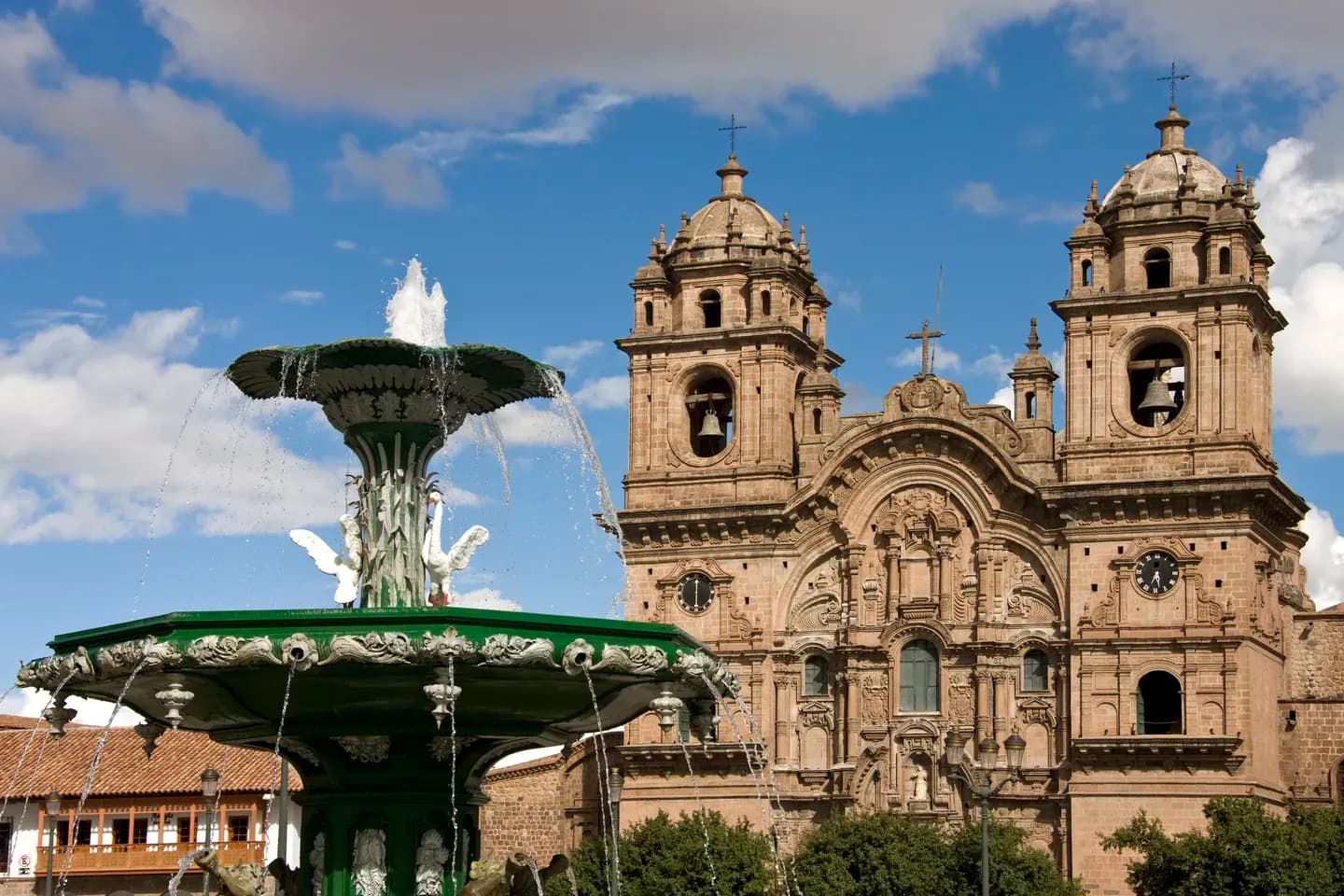 The Compañía de Jesús church and the fountain on the Plaza de Armas, Cusco, Peru
