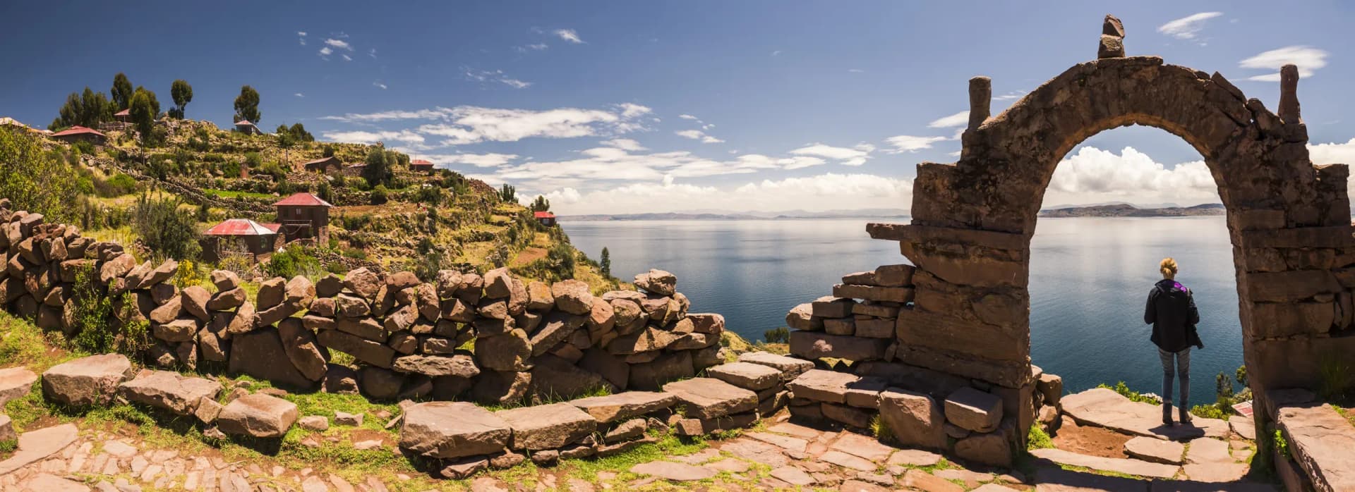 A stone arch on Taquile island above Lake Titicaca, Peru