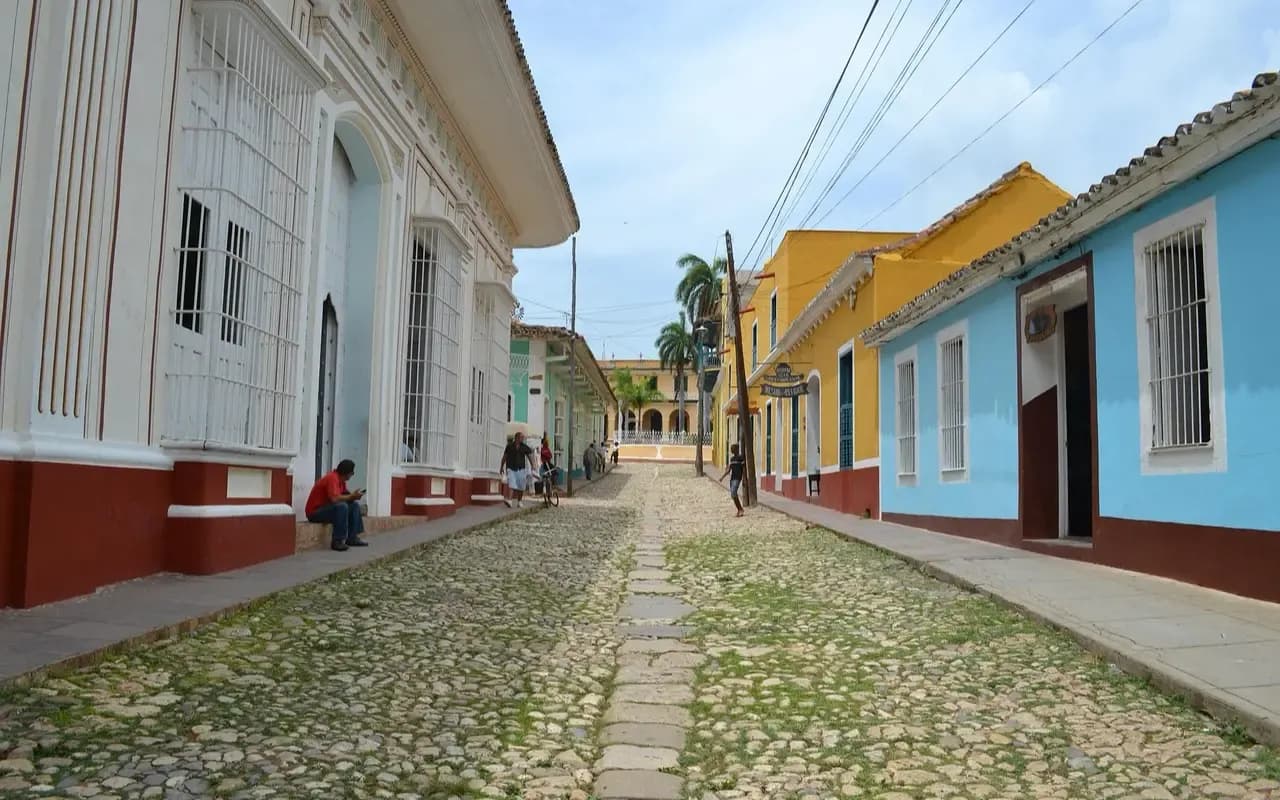 Cobbled street lined with colourful colonial houses in Trinidad, Cuba UNESCO World Heritage Site