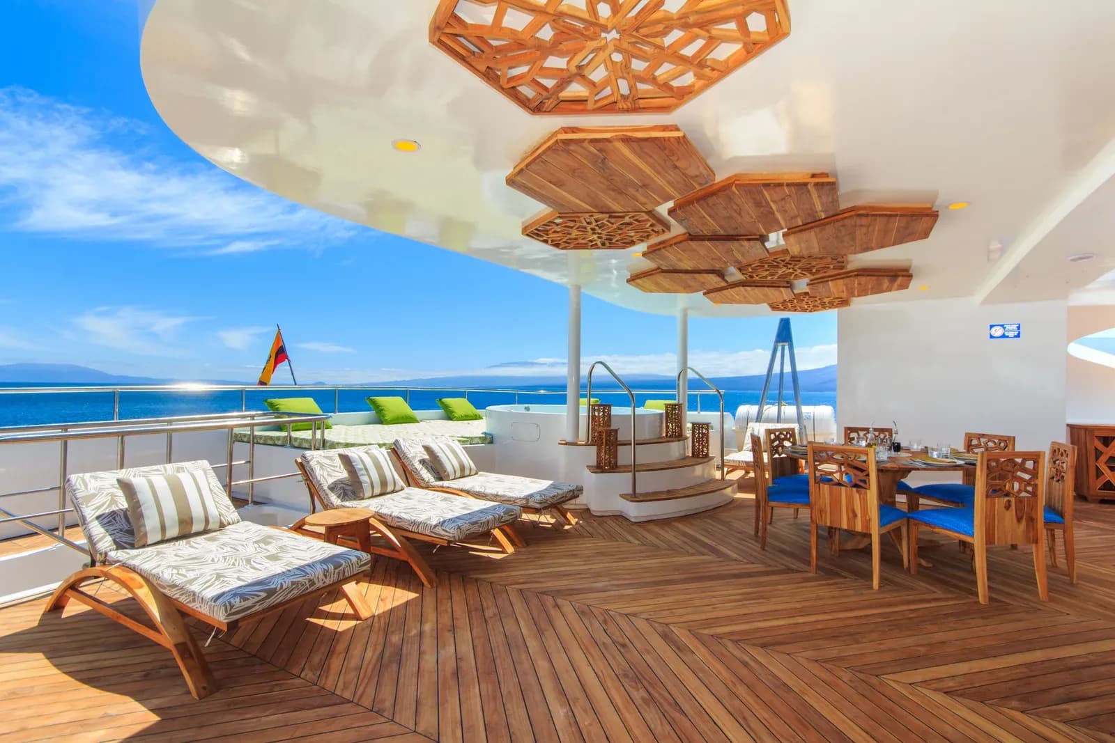 Sun loungers on the sky deck of the Elite catamaran, Galápagos